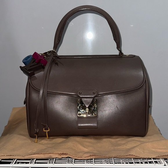 Louis Vuitton Handbags - Luis Vuitton Neo Speedy with authentic LV bag charm.